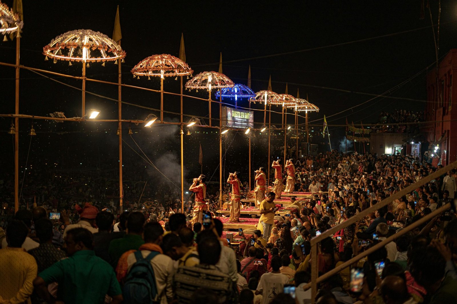 Hindu Priests Performing Evening Ritual Worshipping River Ganga